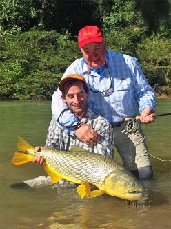 Mike Michalak with a golden dorado at Pluma Lodge