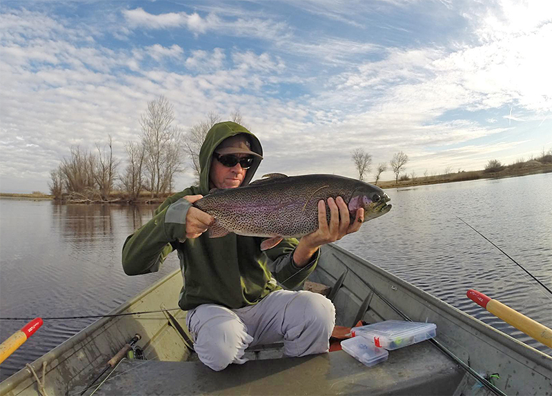 Russ Kegler with a huge rainbow at Luk Lake