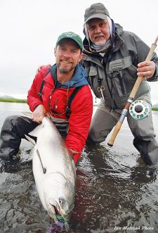 Holding landed Chinook salmon
