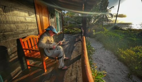 Man playing guitar at ESB Lodge