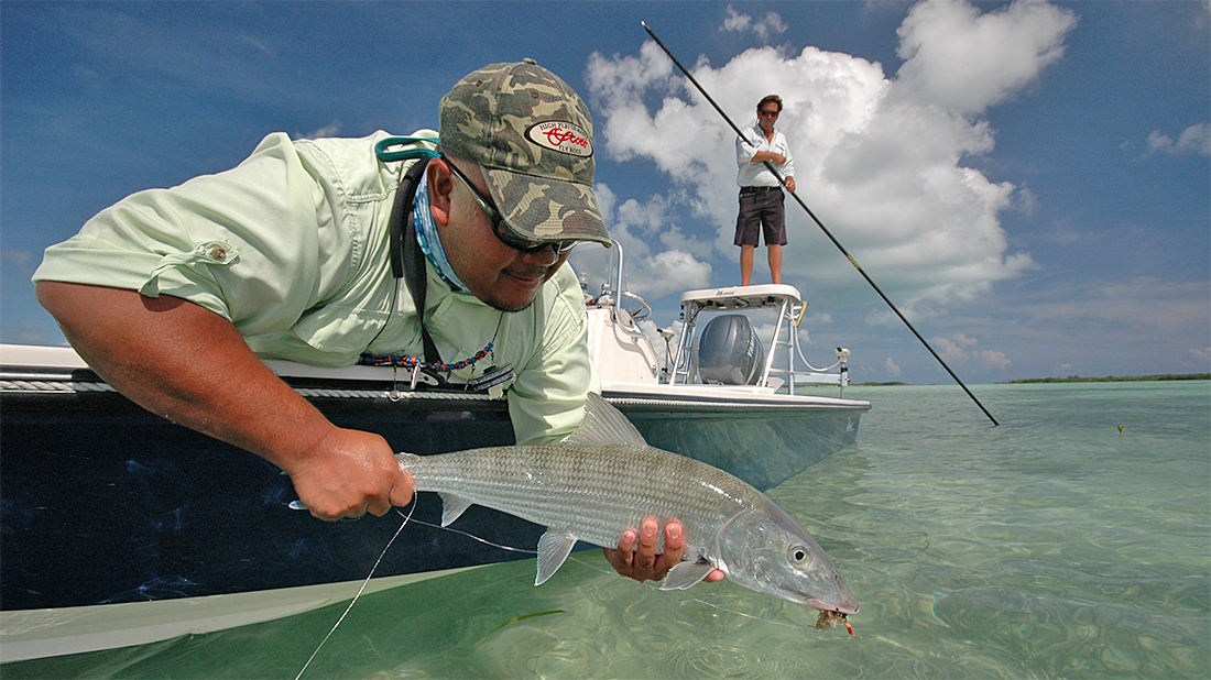Holding bonefish with Scott Fly Rods hat