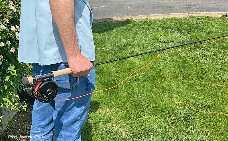 Eric Fields holding the new Sage R8 fly rod