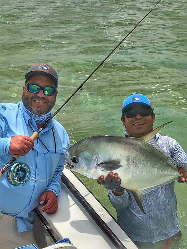 Ken Morando with a permit at ESB Lodge