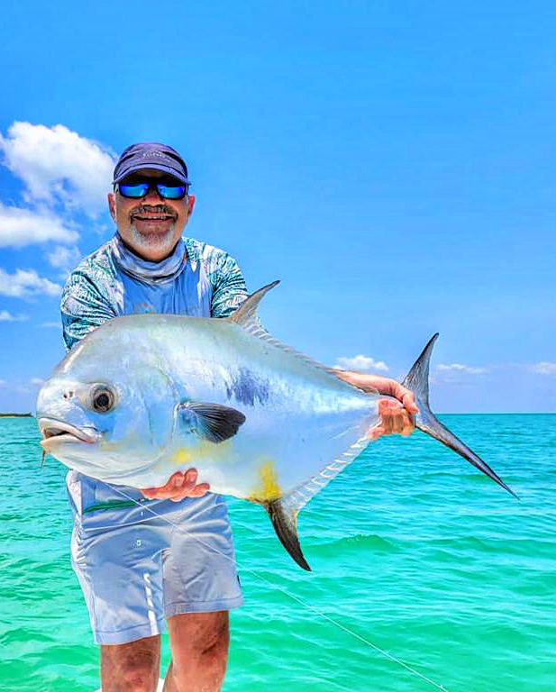 Guy holding permit at ESB Lodge