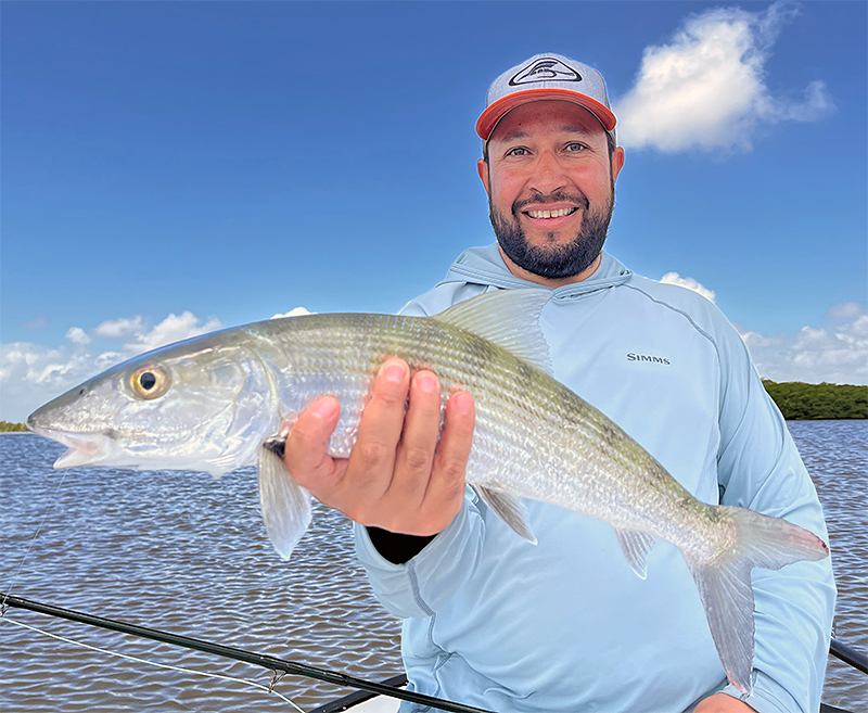 Erik Argotti holding a bonefish at ESB Lodge