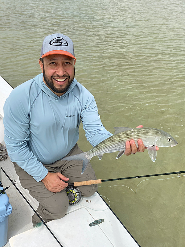 Erik Argotti holding bonefish