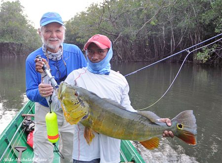Don Causey with a peacock bass on the Mataveni in Colombia
