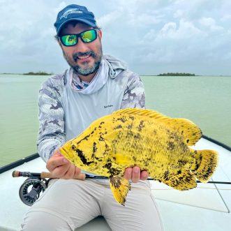 man with esb tripletail