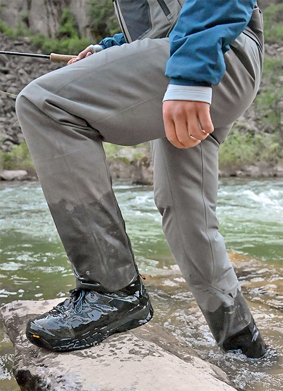 Stepping onto a rock in Skwala RS Waders