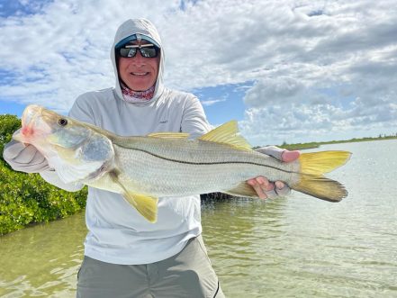 man with ESB Snook