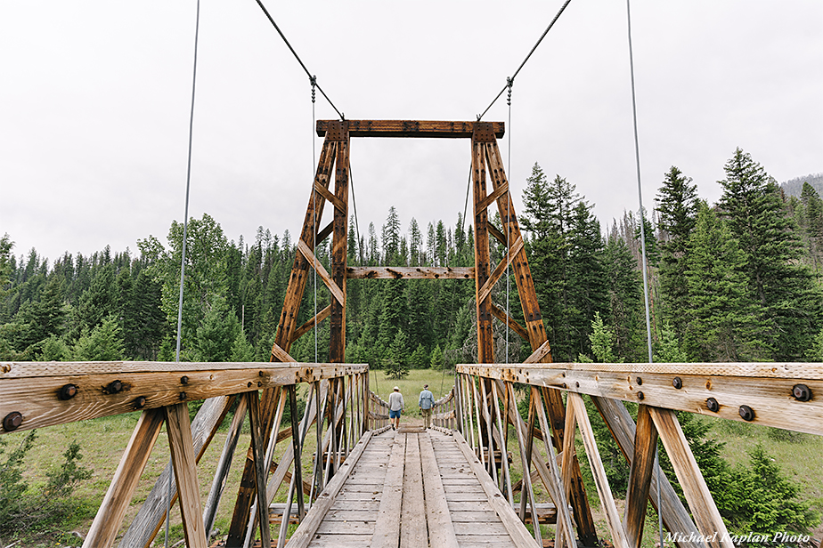 Walking across the wooden bridge