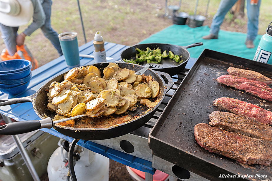 Cooking dinner after a long day of riding