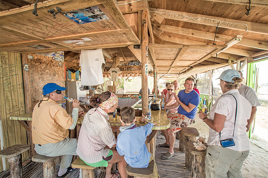 Sitting at the outside bar at Swain's Cay Lodge