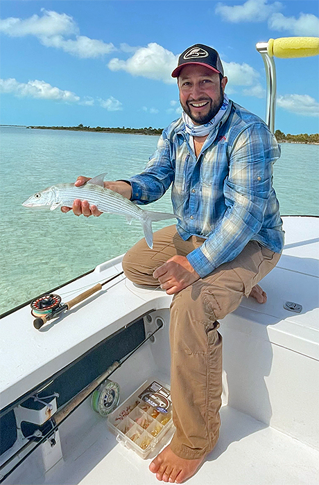 Erik Argotti holding a bonefish in the Bahamas