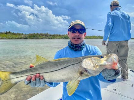 man with ESB Snook