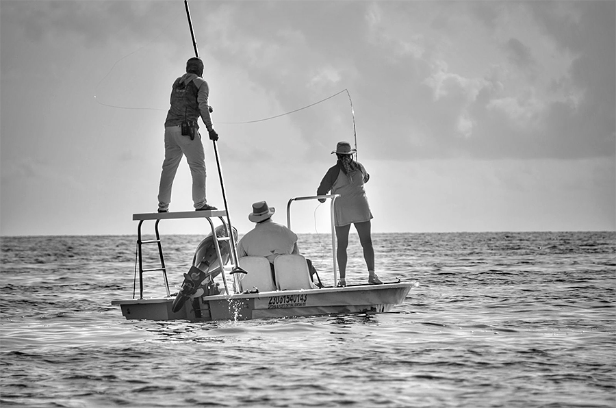 Lian Forrester casting from the skiff at ESB Lodge