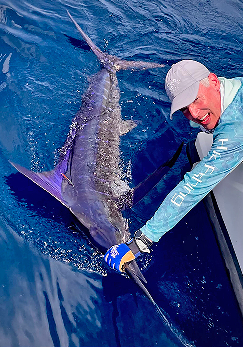 Ghio with the marlin he landed
