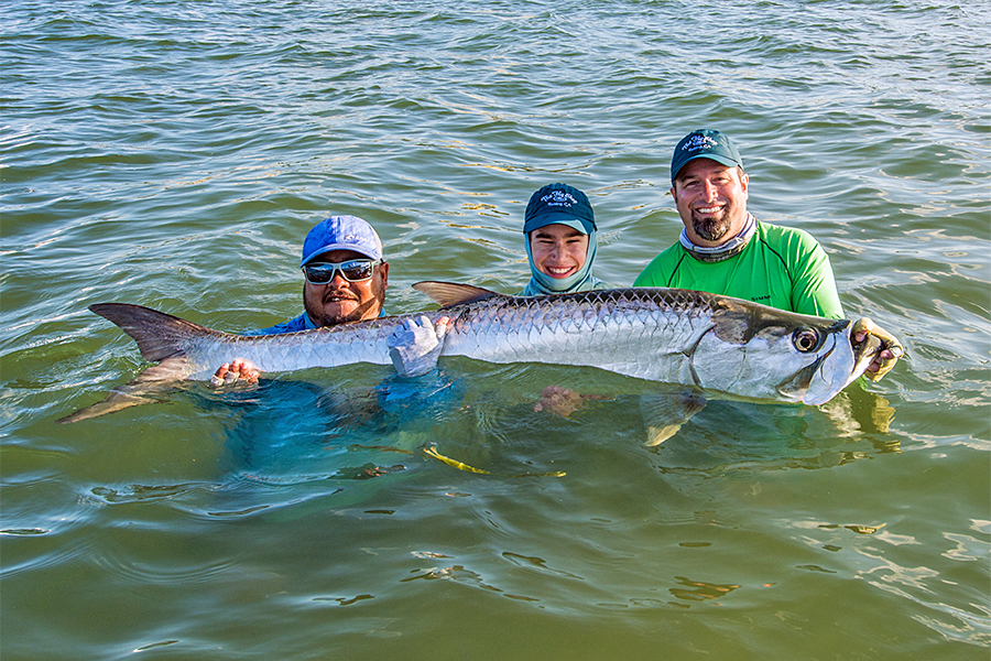 Michael & Mitchell Caranci with a Tarpon in Belize