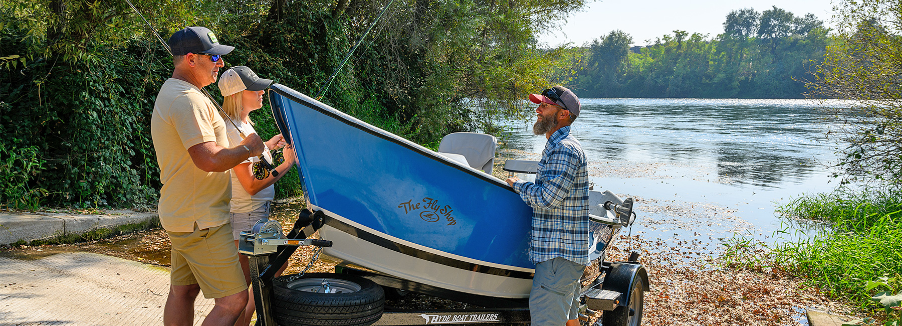 Guide Gary Whitmire with clients at Hughes Landing