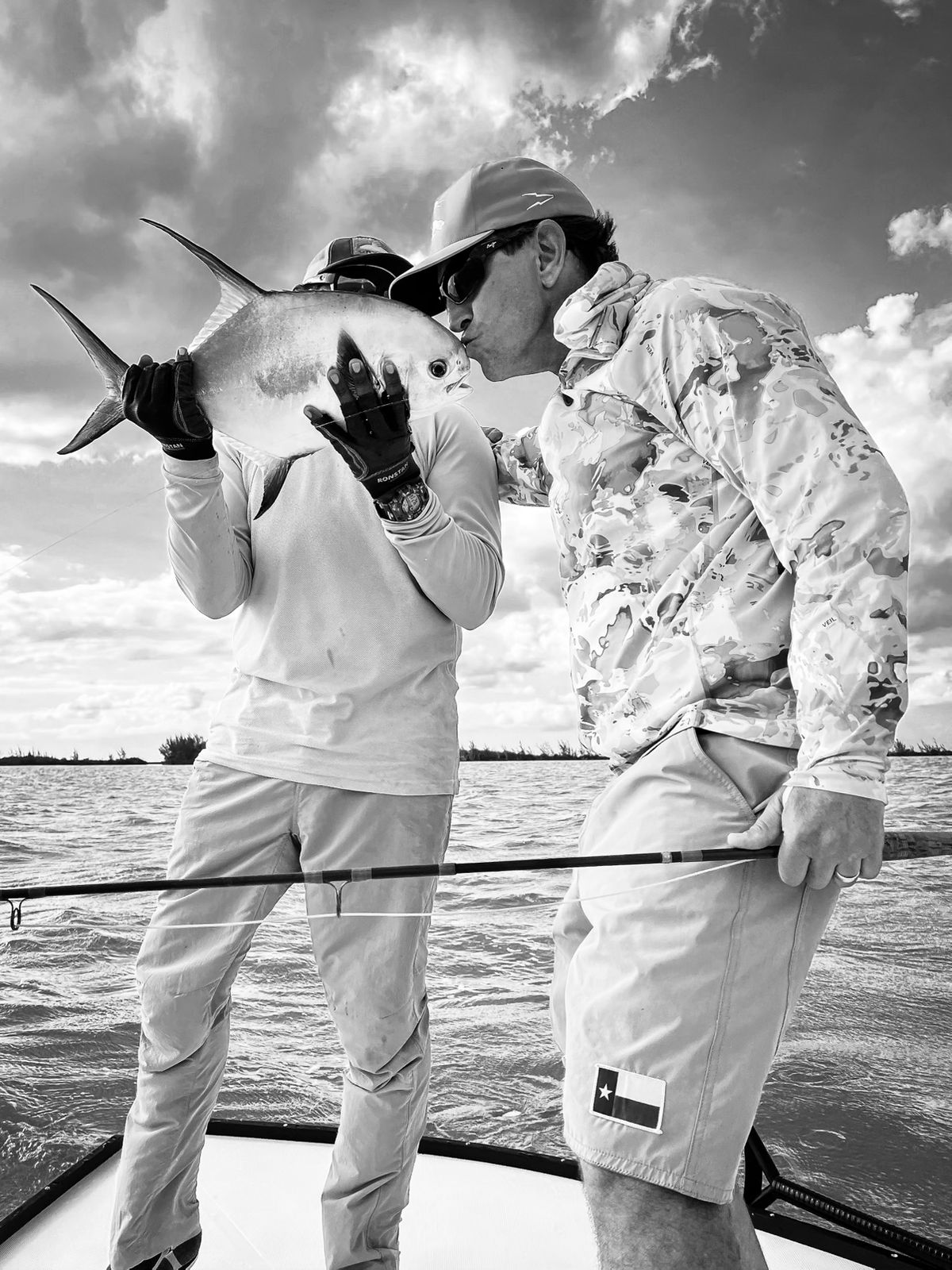 ESB Angler Kissing a Permit