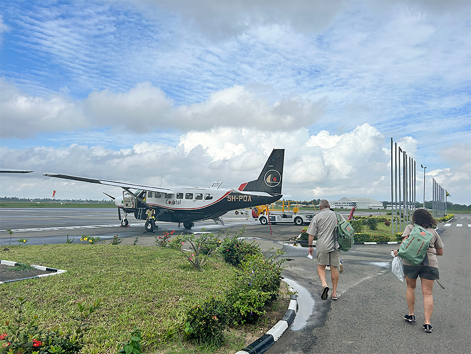 Walking to the charter plane in Dar es Salaam