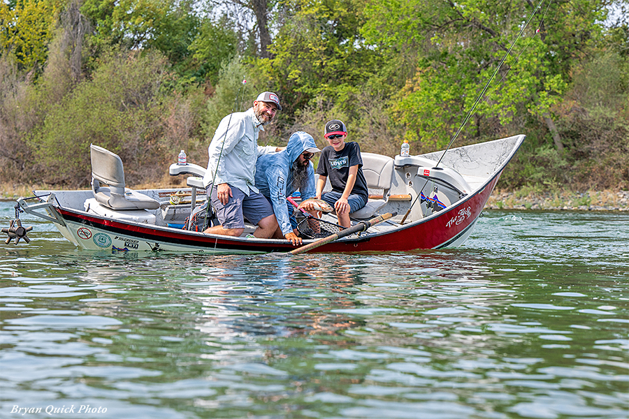 Father and son fishing with a TFS guide on the Lower Sacramento River