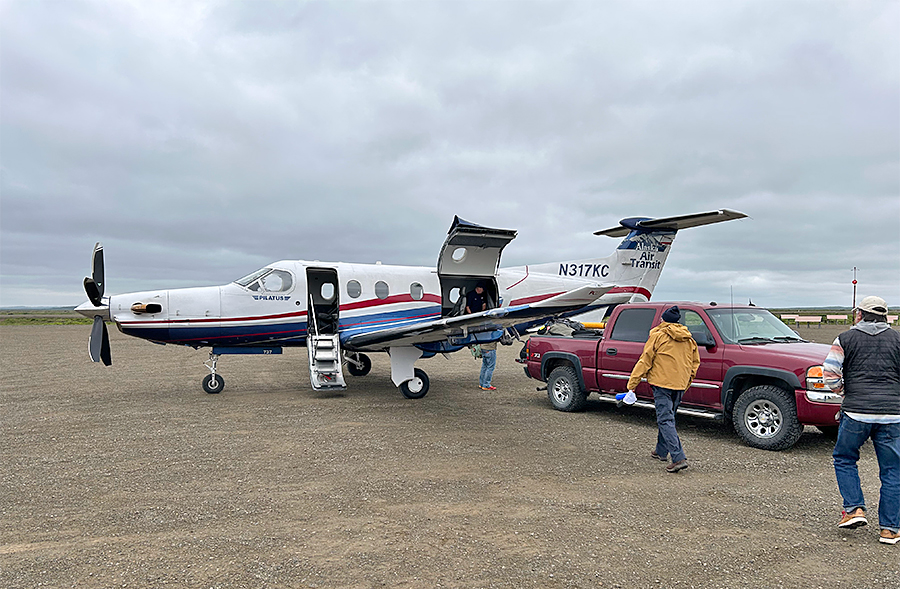Loading the Pilatus PC-12 charter plane for the flight to Pilot Point