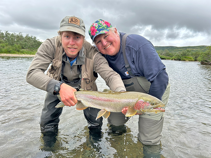 Dan Conklin with his guide a beautiful leopard rainbow trout