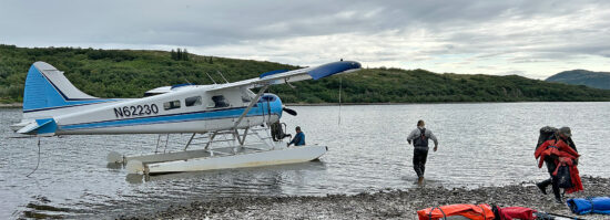 Unloading the float plane in Alaska