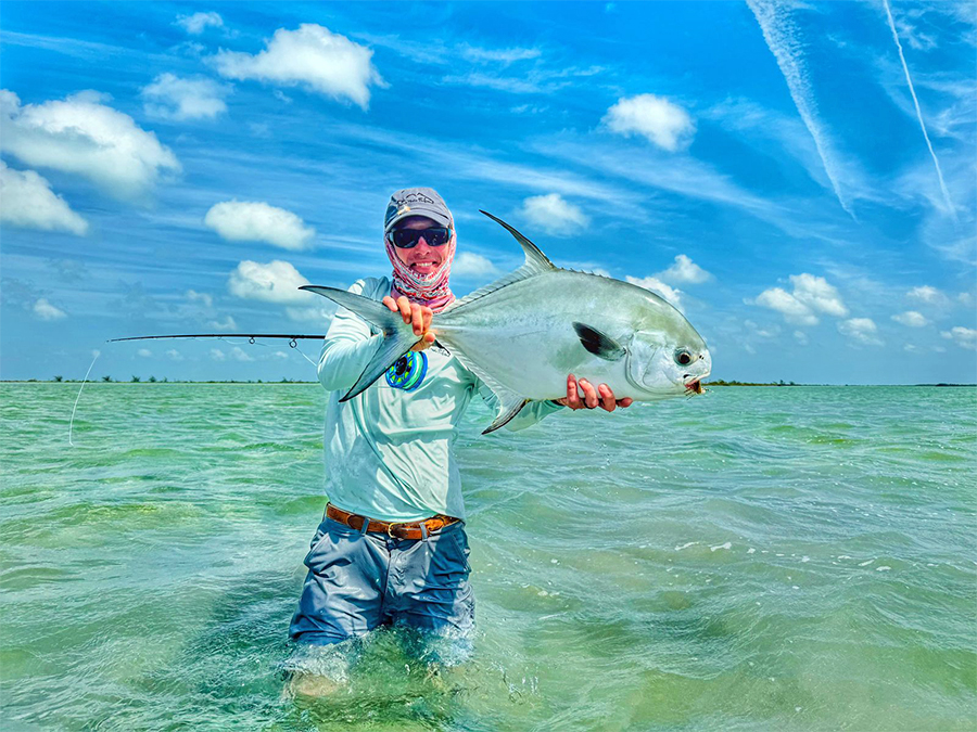 Ben Paschal holding a nice Permit at ESB Lodge