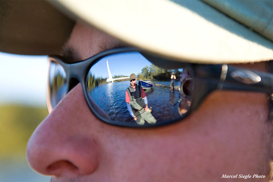 Angler wearing mirrored sunglasses