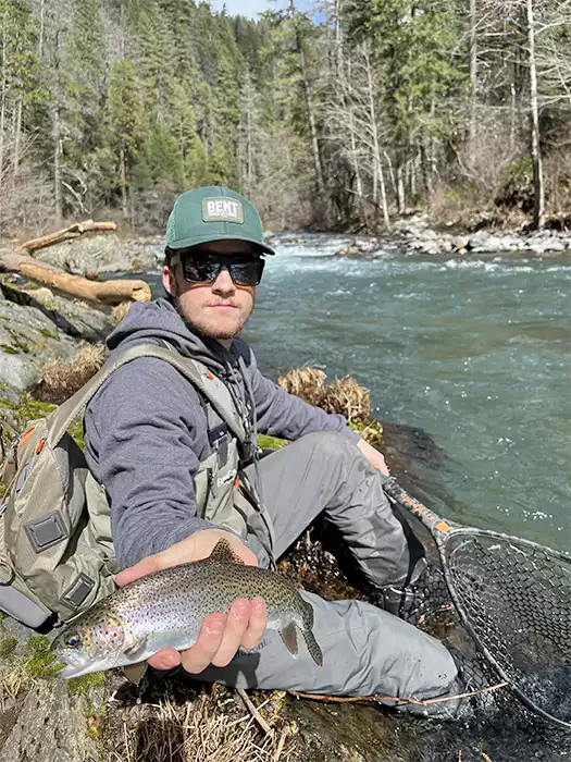 Joel Crandall holding a rainbow trout