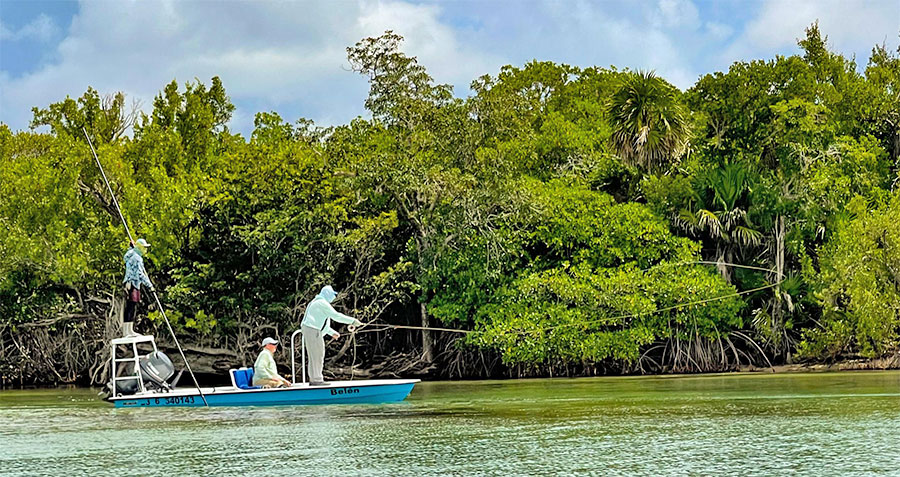 Angler casting from the skiff at ESB Lodge