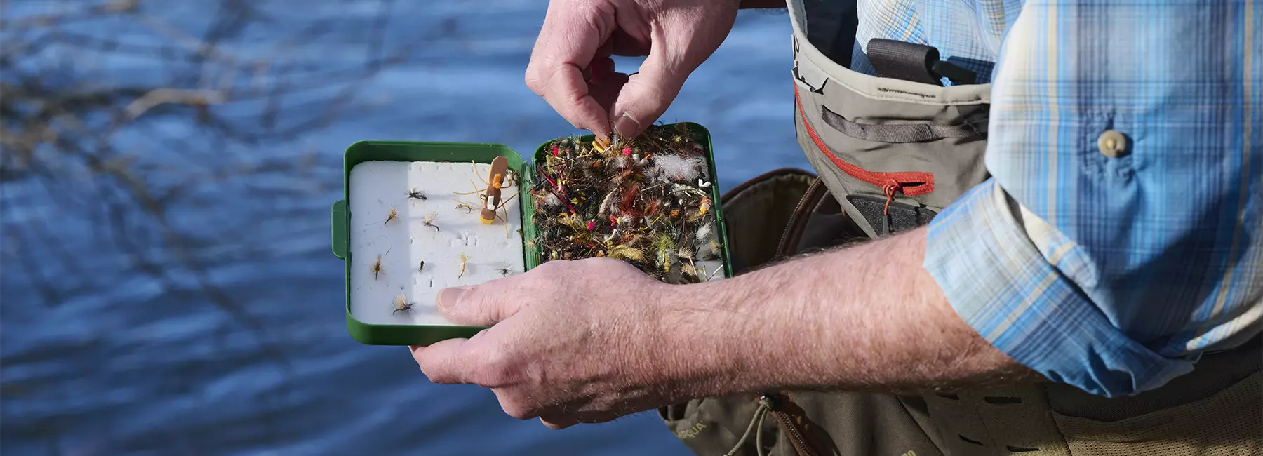 Mike Mercer selecting flies from his fly box