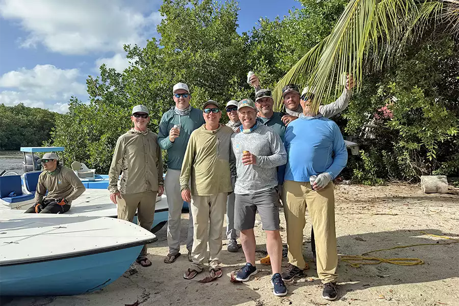Angling guests standing in front of boats at ESB Lodge