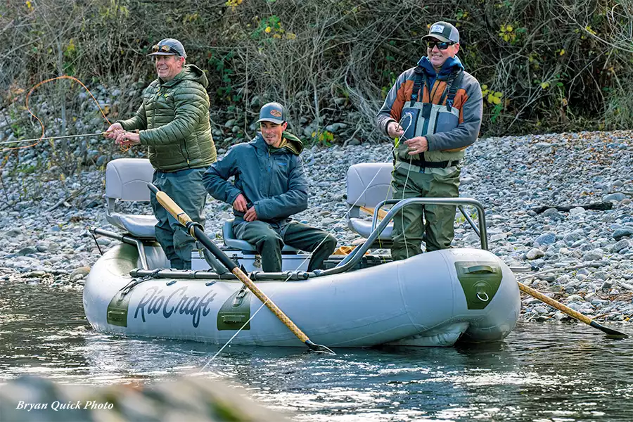 Chris King fishing out of a raft on the Trinity River