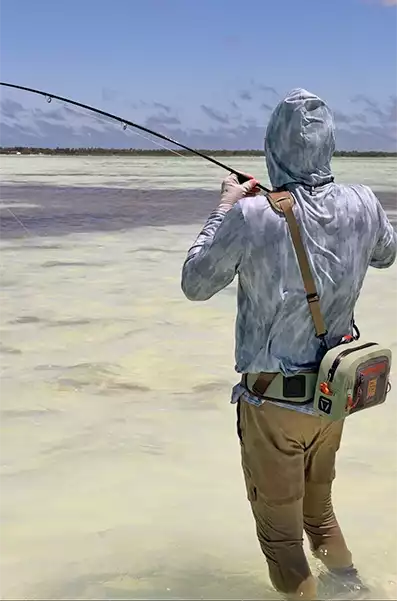 Chris King fighting a fish at Christmas Island