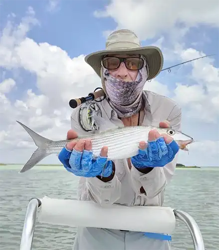 Angler holding a bonefish at ESB Lodge